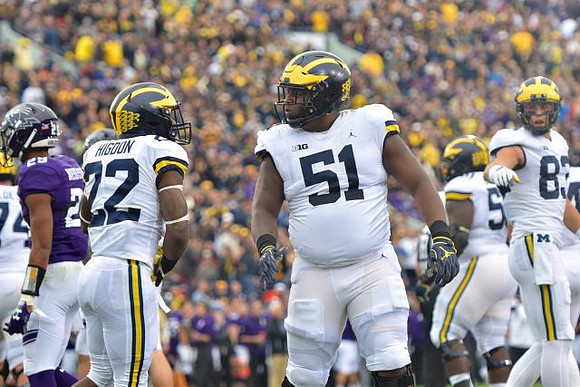 Ben Bredeson (74), Karan Higdon (22), Cesar Ruiz (51), Michael Onwenu (50), and Zach Gentry (83)