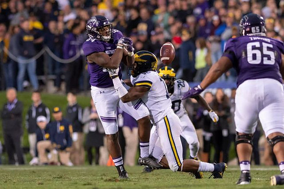 Josh Metellus (14) and Brad Hawkins (20)