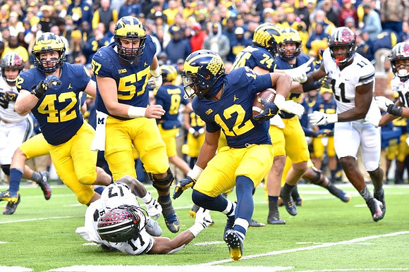 Ben Mason (42), Patrick Kugler (57), Chris Evans (12), and Ben Bredeson (74)