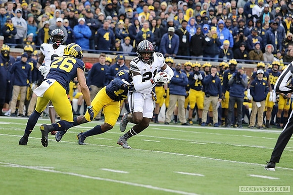 J'Marick Woods (26) and Josh Metellus (14)