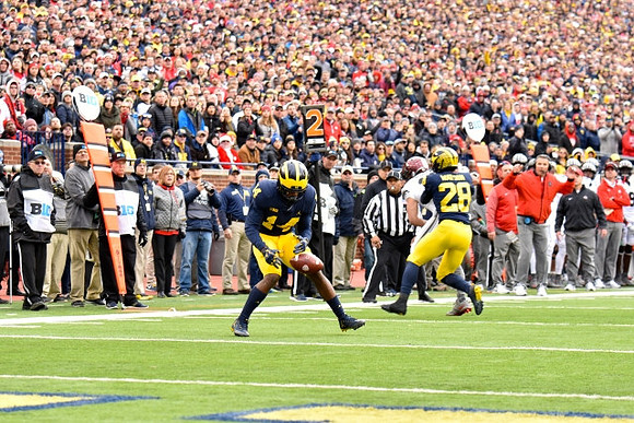 Josh Metellus (14) and Brandon Watson (28)