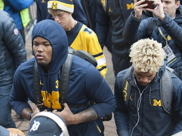 Rashan Gary (3) and Eddie McDoom (13)
