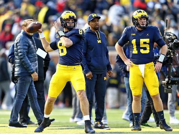John O'Korn (8), Pep Hamilton, and Alex Malzone (15)