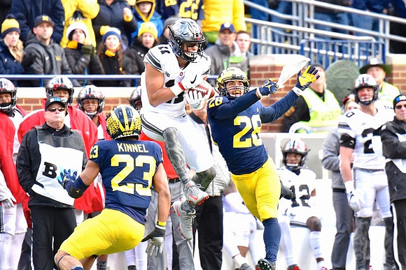 Tyree Kinnel (23) and Brandon Watson (28)