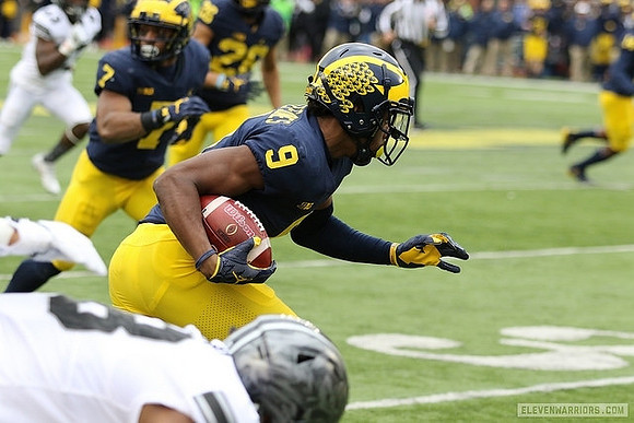 Donovan Peoples-Jones (9) and Khaleke Hudson (7)