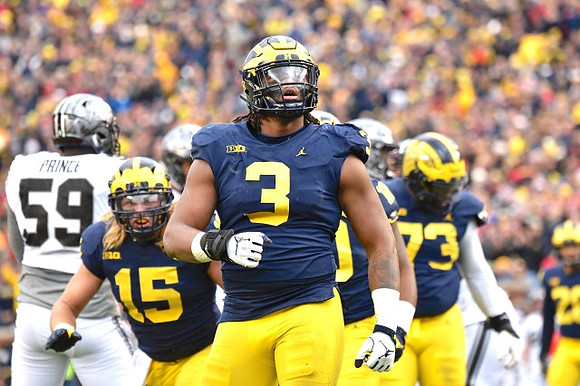 Chase Winovich (15), Rashan Gary (3), and Maurice Hurst (73)