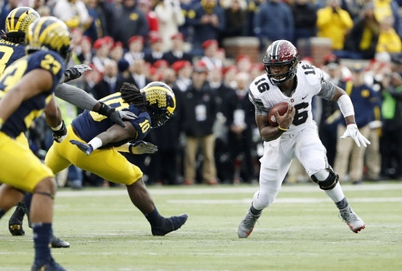 Devin Bush (10) and Tyree Kinnel (23)