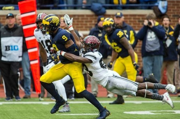 Donovan Peoples-Jones (9) and Devin Gil (36)