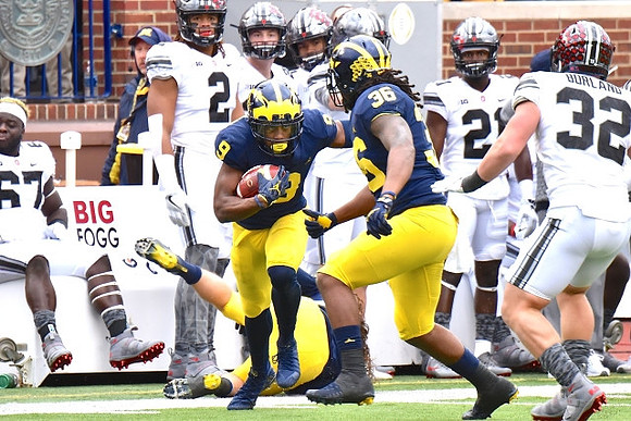 Donovan Peoples-Jones (9) and Devin Gil (36)