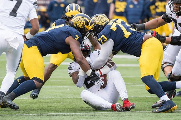Rashan Gary (3), Devin Bush (10), and Maurice Hurst (73)