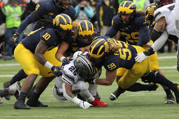 Devin Bush (10), Mike McCray (9), Chase Winovich (15), Noah Furbush (59), and Jordan Glasgow (29)