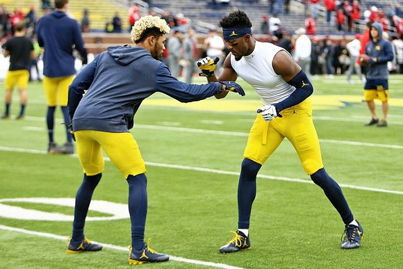 Eddie McDoom (13) and Maurice Ways (85)