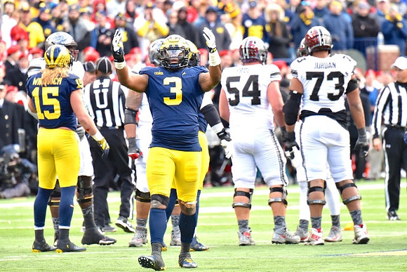 Chase Winovich (15) and Rashan Gary (3)