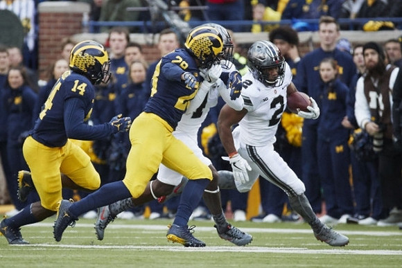 Josh Metellus (14) and Brandon Watson (28)
