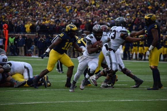 Devin Bush (10) and Rashan Gary (3)
