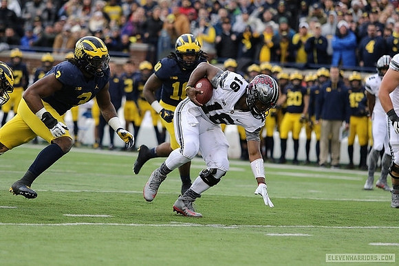 Rashan Gary (3) and Devin Bush (10)