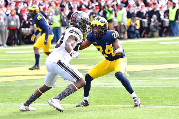 Josh Metellus (14) and Lavert Hill (24)
