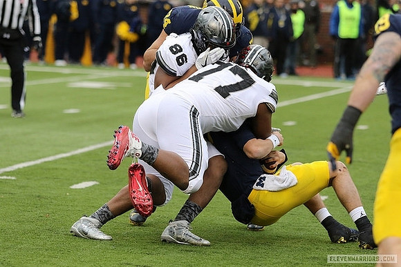 Ben Bredeson (74), John O'Korn (8), and Henry Poggi (19)