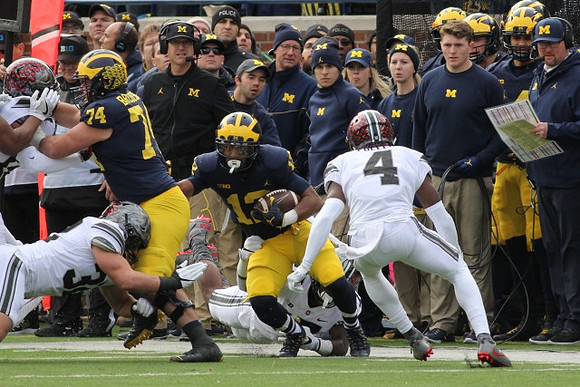 Ben Bredeson (74) and Chris Evans (12)