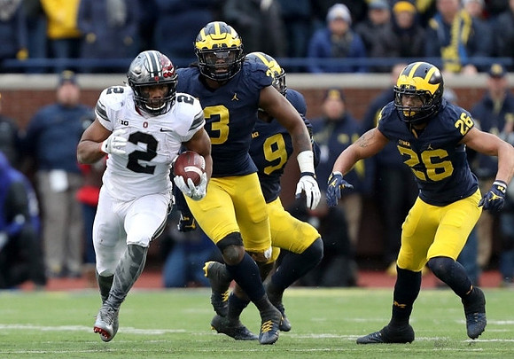 Rashan Gary (3), Mike McCray (9), and J'Marick Woods (26)