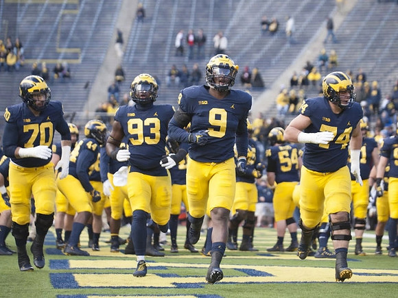 Nolan Ulizio (70), Lawrence Marshall (93), Mike McCray (9), and Ben Bredeson (74)