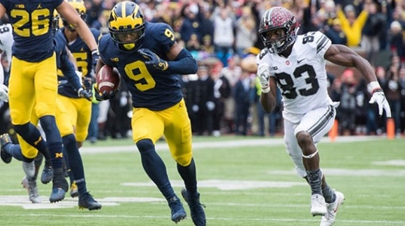 J'Marick Woods (26) and Donovan Peoples-Jones (9)