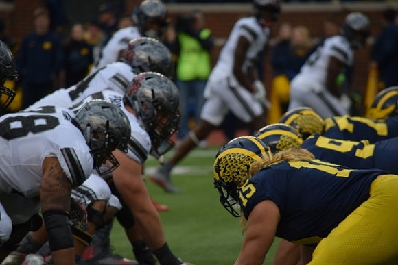 Chase Winovich (15), Bryan Mone (90), and Maurice Hurst (73)