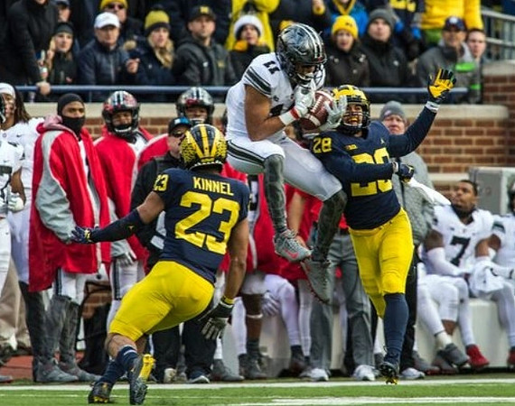 Tyree Kinnel (23) and Brandon Watson (28)
