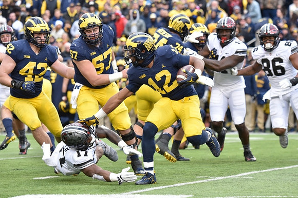 Ben Mason (42), Patrick Kugler (57), Chris Evans (12), and Ben Bredeson (74)
