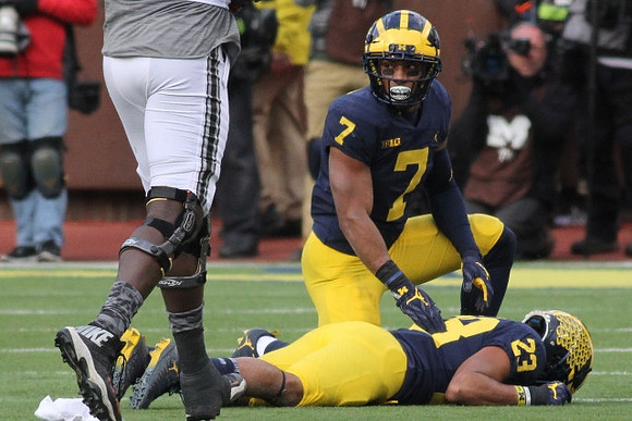 Khaleke Hudson (7) and Tyree Kinnel (23)