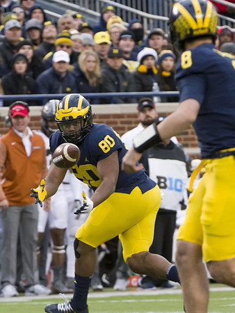 Khalid Hill (80) and John O'Korn (8)