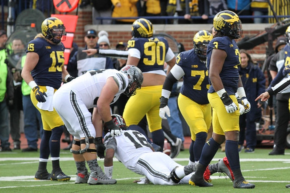 Chase Winovich (15), Bryan Mone (90), Maurice Hurst (73), and Rashan Gary (3)