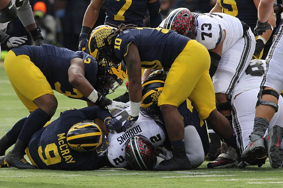 Mike McCray (9), Rashan Gary (3), and Devin Bush (10)