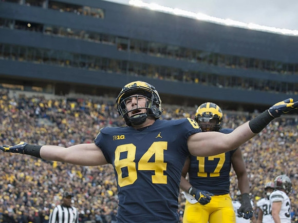 Sean McKeon (84) and Tyrone Wheatley Jr. (17)