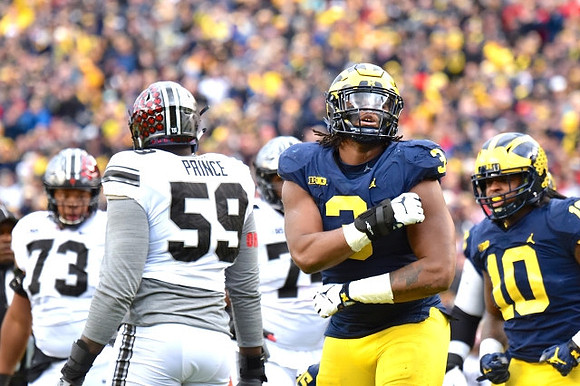Rashan Gary (3) and Devin Bush (10)