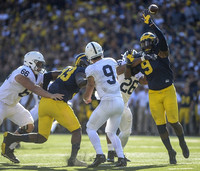 Taco Charlton (33) and Mike McCray (9)