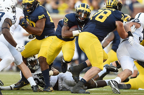 Khalid Hill (80), Chris Evans (12), and Erik Magnuson (78)