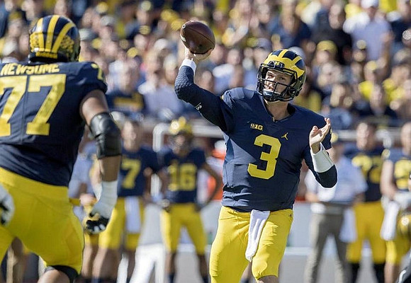 Grant Newsome (77) and Wilton Speight (3)