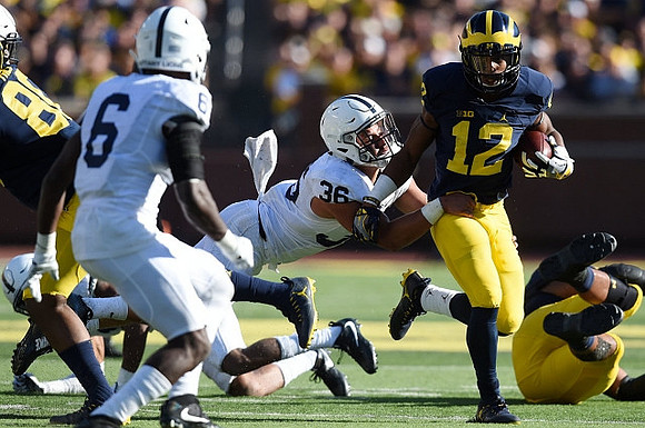 Khalid Hill (80) and Chris Evans (12)