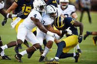 Chase Winovich (15) and Jourdan Lewis (26)