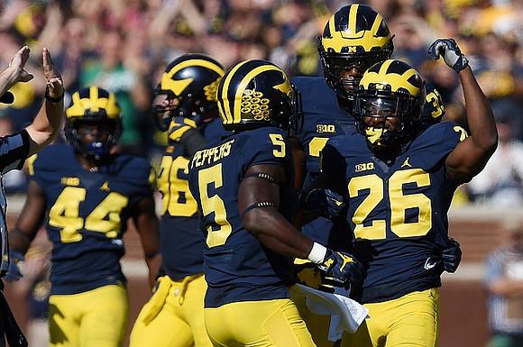 Delano Hill (44), Ryan Glasgow (96), Jabrill Peppers (5), and Jourdan Lewis (26)