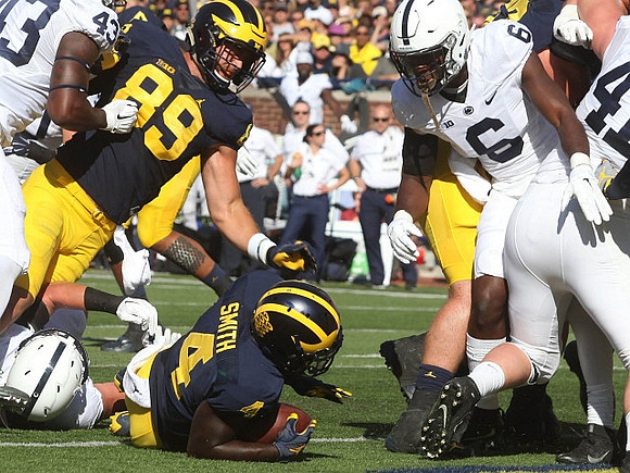 Ian Bunting (89) and De'Veon Smith (4)