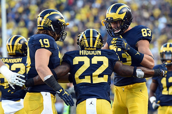 Amara Darboh (82), Henry Poggi (19), Karan Higdon (22), Zach Gentry (83), and Chris Evans (12)