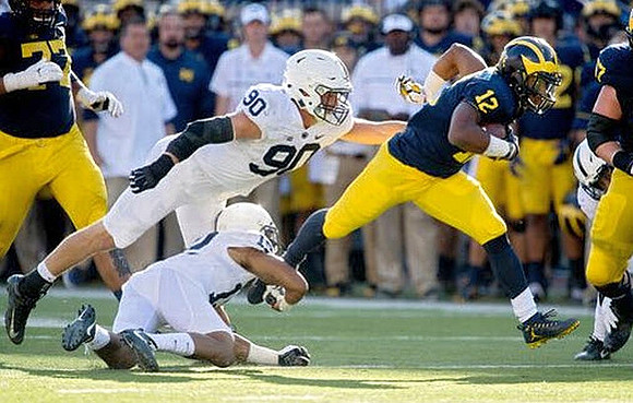 Grant Newsome (77), Chris Evans (12), and Kyle Kalis (67)
