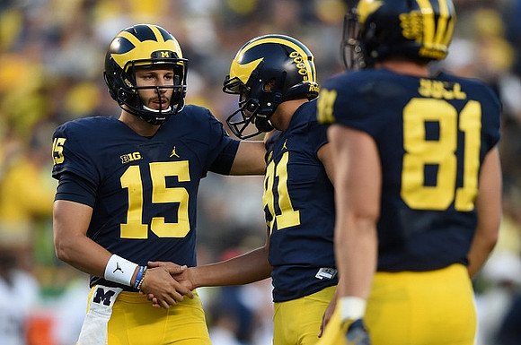 Garrett Moores (15), Kenny Allen (91), and Michael Jocz (81)