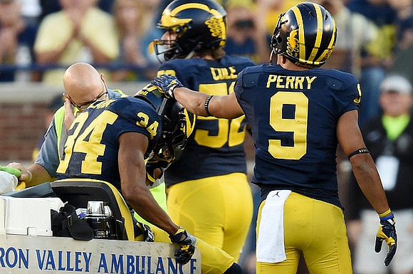 Jeremy Clark (34), Mason Cole (52), and Grant Perry (9)