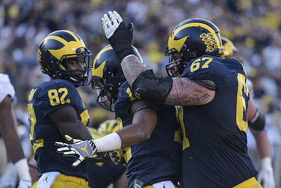 Amara Darboh (82), Chris Evans (12), and Kyle Kalis (67)
