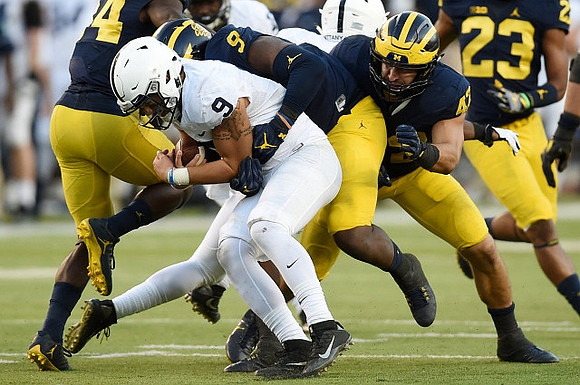 Jeremy Clark (34), Mike McCray (9), Ben Gedeon (42), and Tyree Kinnel (23)