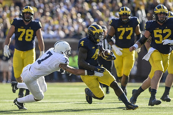 Erik Magnuson (78), De'Veon Smith (4), Grant Newsome (77), and Mason Cole (52)
