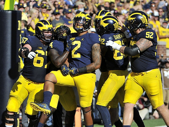 Kyle Kalis (67), De'Veon Smith (4), Devin Asiasi (2), Amara Darboh (82), and Mason Cole (52)